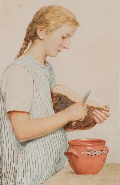 Jeune fille coupant le pain