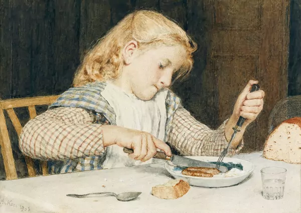 Speisendes Mädchen am Tisch