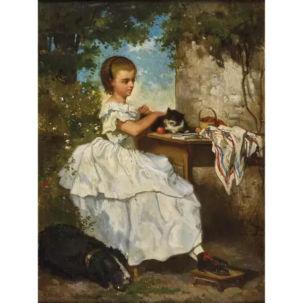Mädchen mit Kätzchen an einem Tisch im Freien