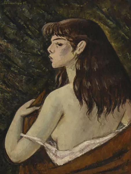 Jeune fille rousse de profil