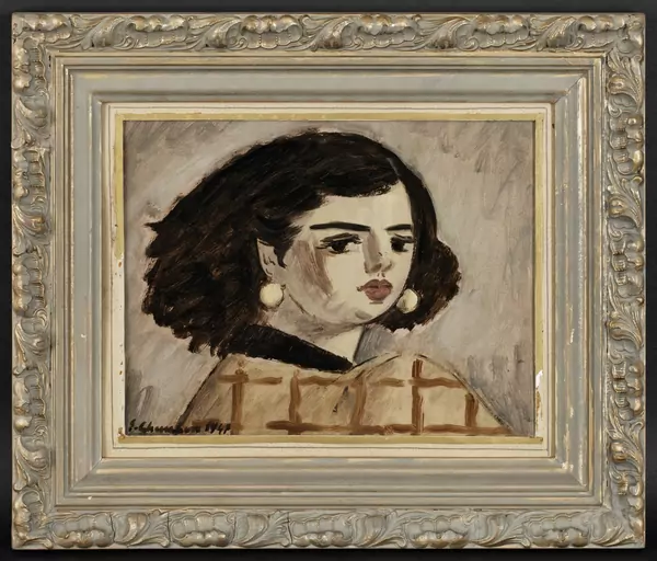 Portrait de femme au manteau à carreaux
