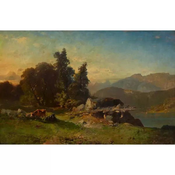 Weidende Kühe oberhalb eines Bergsees