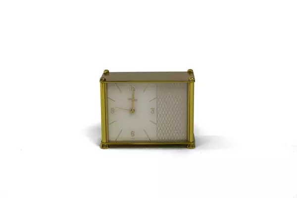 Imhof, pendulette réveil — Genève Enchères