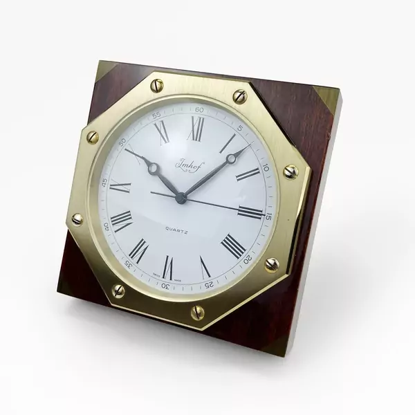 Imhof, pendulette carrée à quartz — Genève Enchères