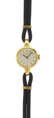 Imhof, montre ronde mécanique — Genève Enchères