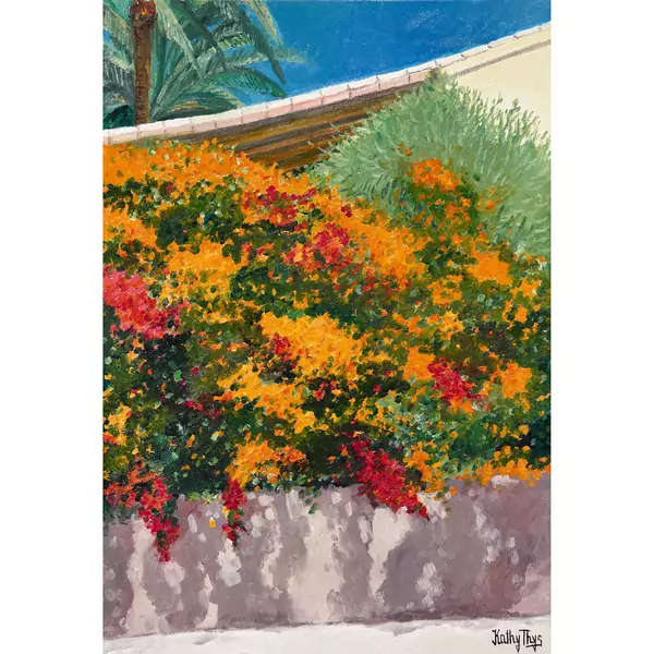 Südliche Gartenpartie mit Blumen und Palme
