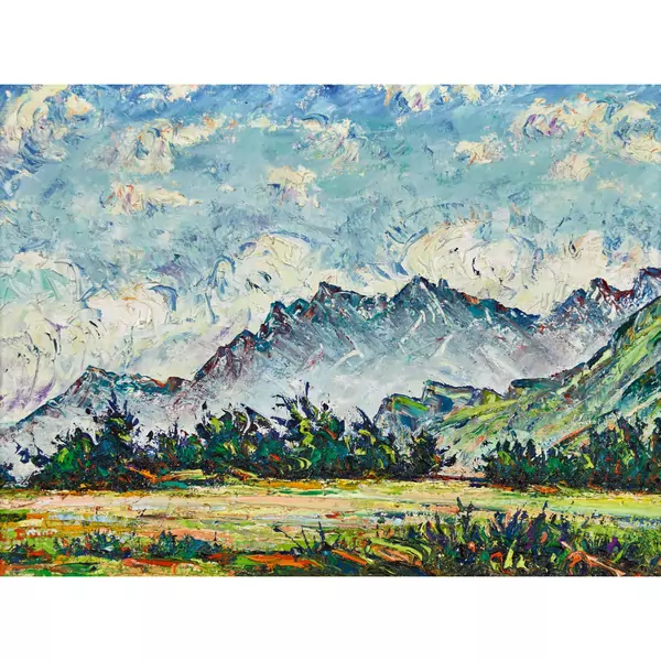 Landschaft mit Wiese und Bergkette