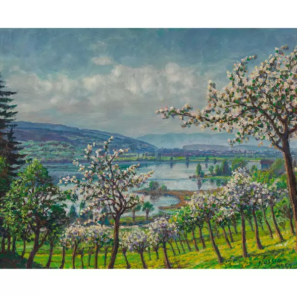 Blühende Bäume am Seeufer