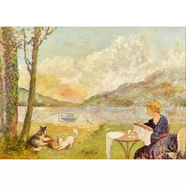Donna seduta al lago