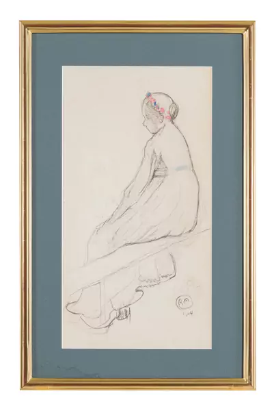 Jeune fille assise de dos