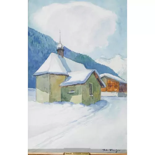 Kapelle in verschneiter Berglandschaft