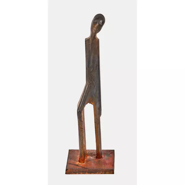 Kleine Figur mit geneigtem Kopf