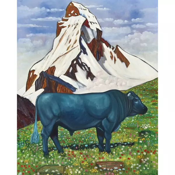 Muni auf blühender Wiese vor dem Matterhorn
