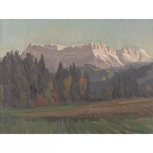 Werner Schmutz — Abendliche Feldlandschaft vor Felsmassiv.